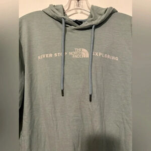 North Face men’s long sleeve hooded shirt never stop exploring light blue size S